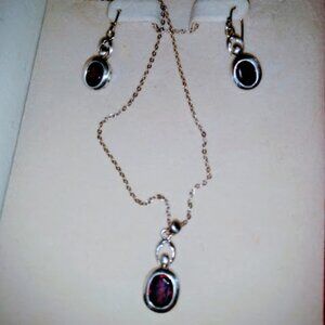 Coldwater creek: Garnet stones and sterling necklace & matching wire earrings.